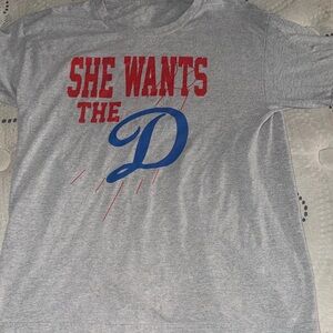 She wants the “ D “ t shirt large grey